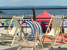 Deck chairs on the sea front